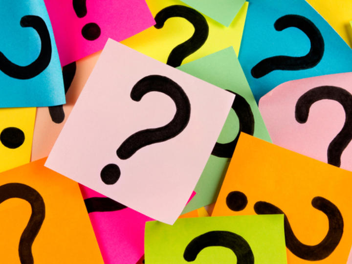question marks on multi-colored post-its